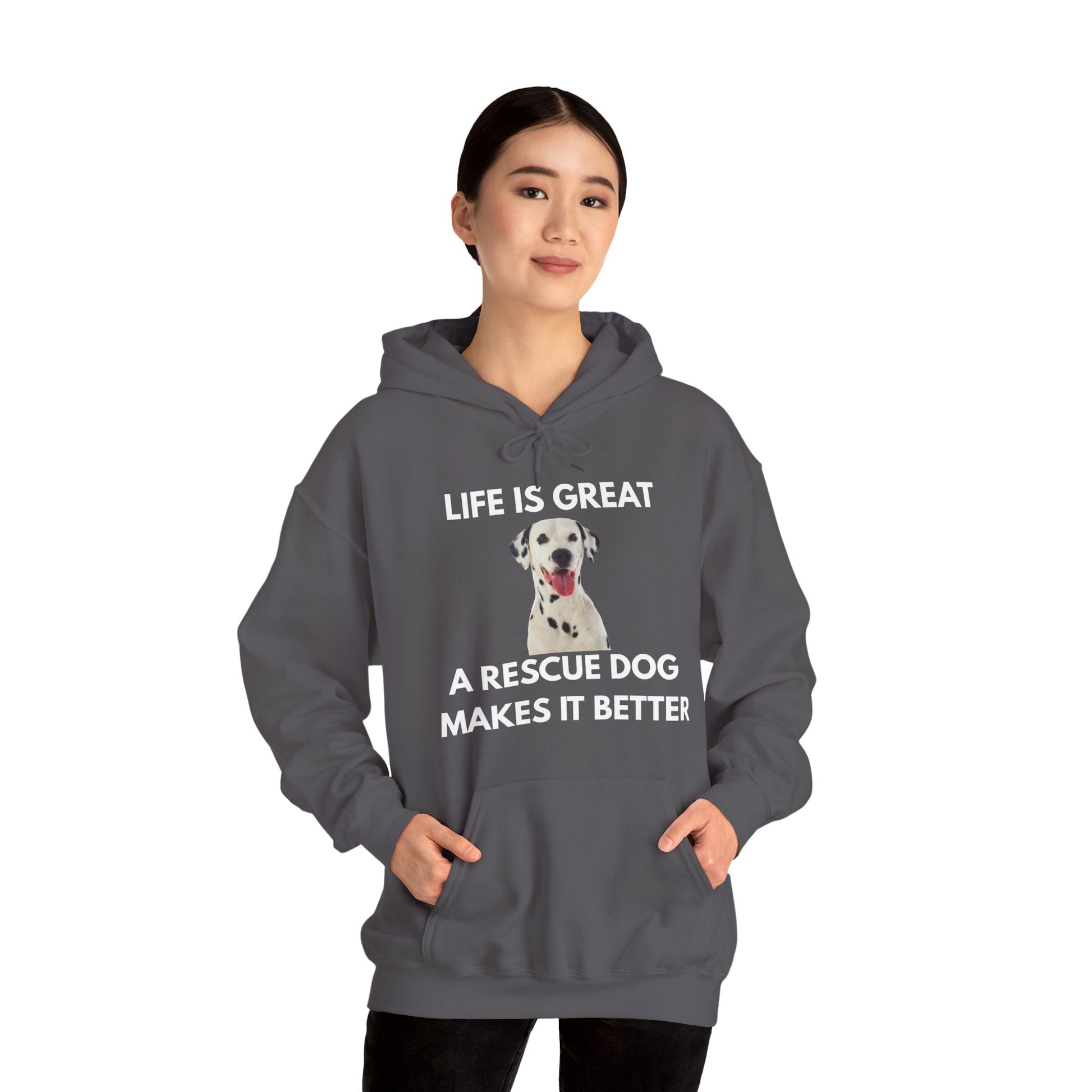 Person wearing a gray hoodie with a dog graphic and text on a white background